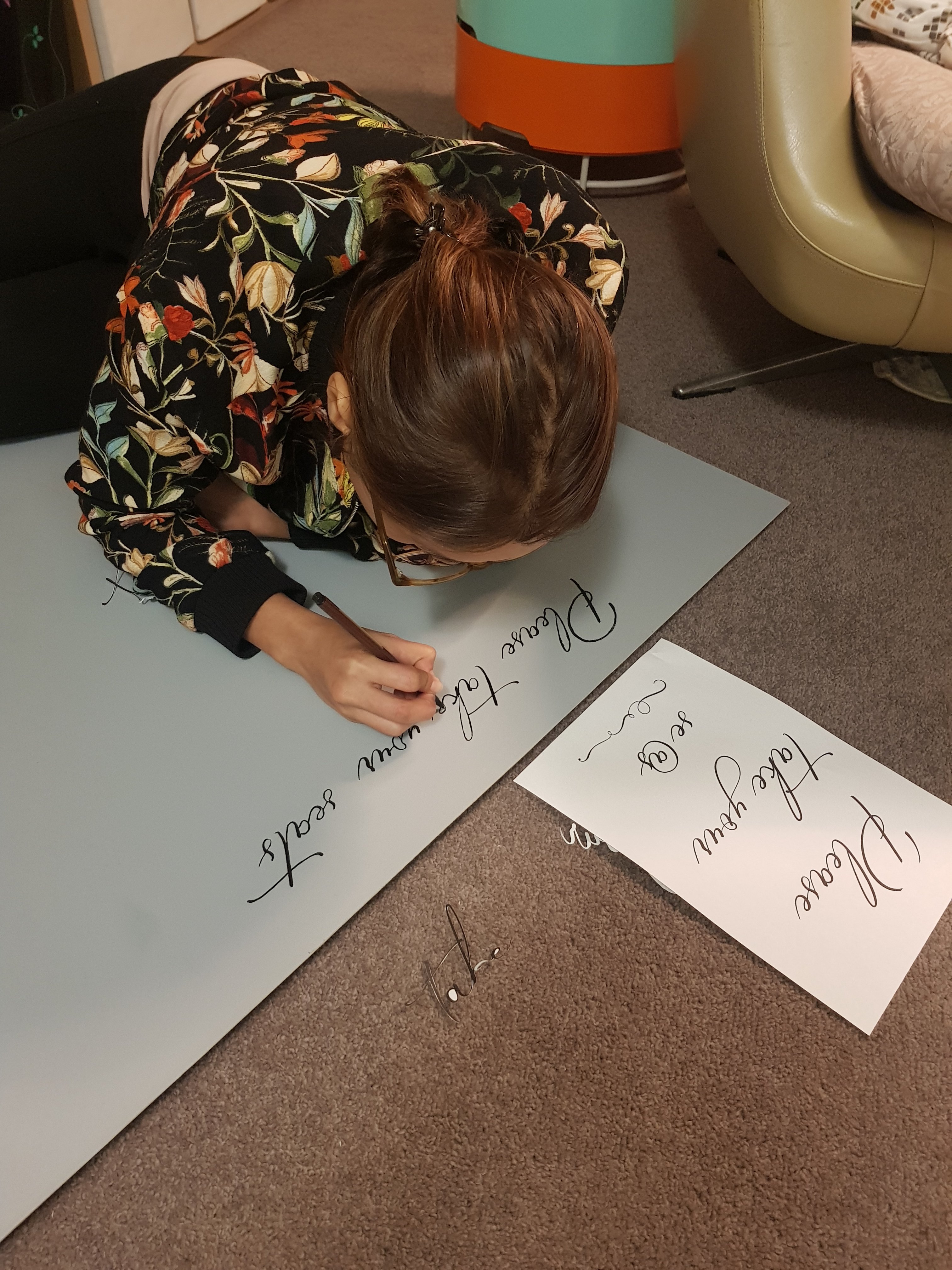 Girl writing calligraphy
